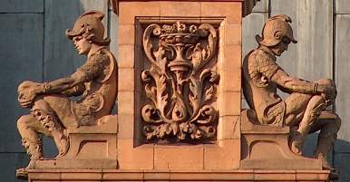 Seated terra cotta statues in art nouveau style, by sculptor Henry Charles Fehr